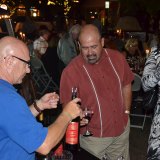 Lemoore Councilmember Ray Madrigal samples some wine.